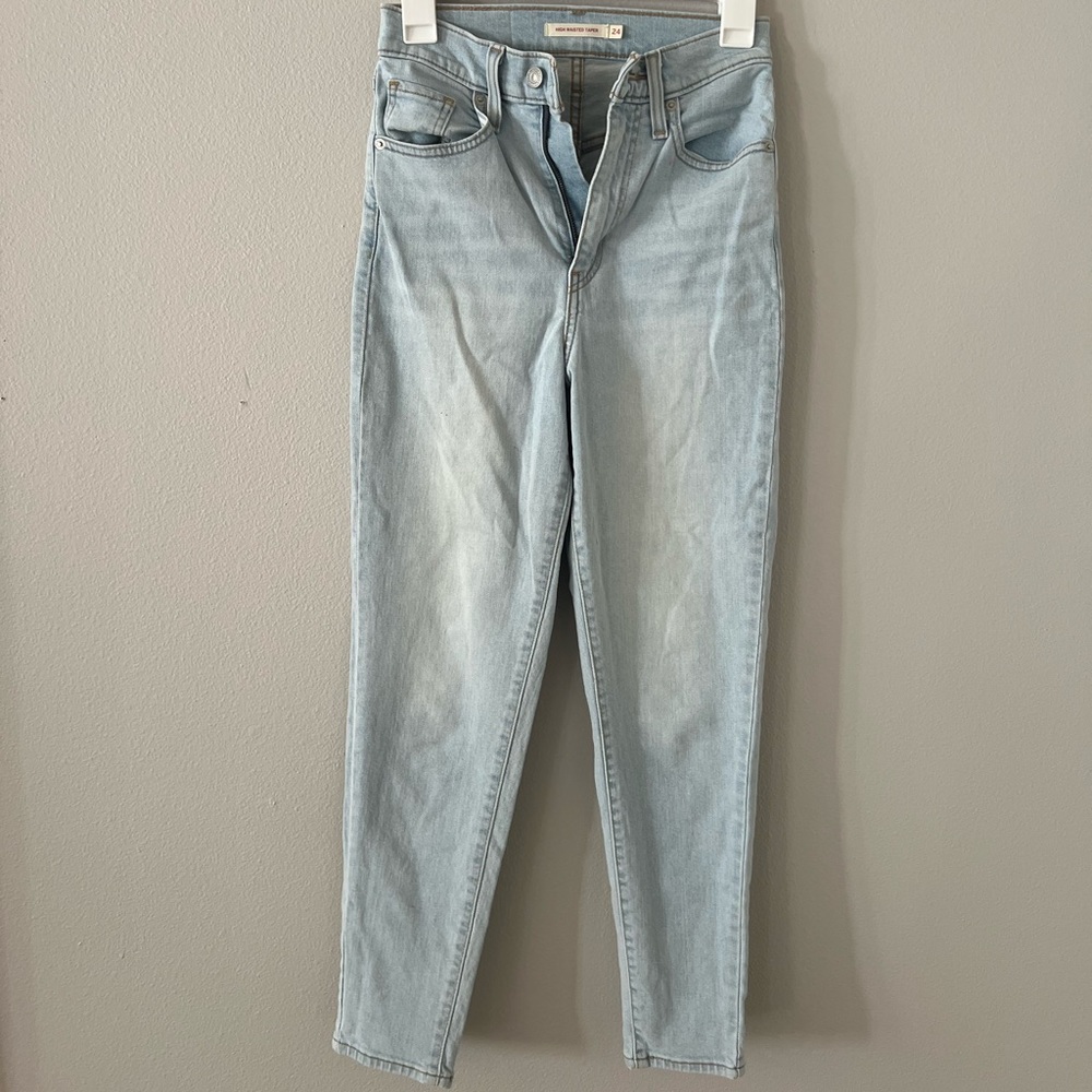 Levi’s light-wash high-waisted tapered jeans. women’s size 24. super comfy